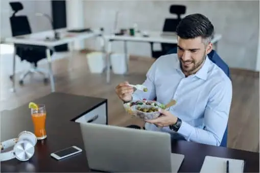 Salesperson on a video virtual lunch with a customer
