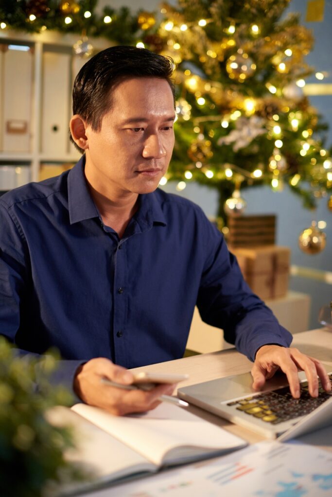 HR manager loading a list of employees to deliver holiday gifts with personalized messages