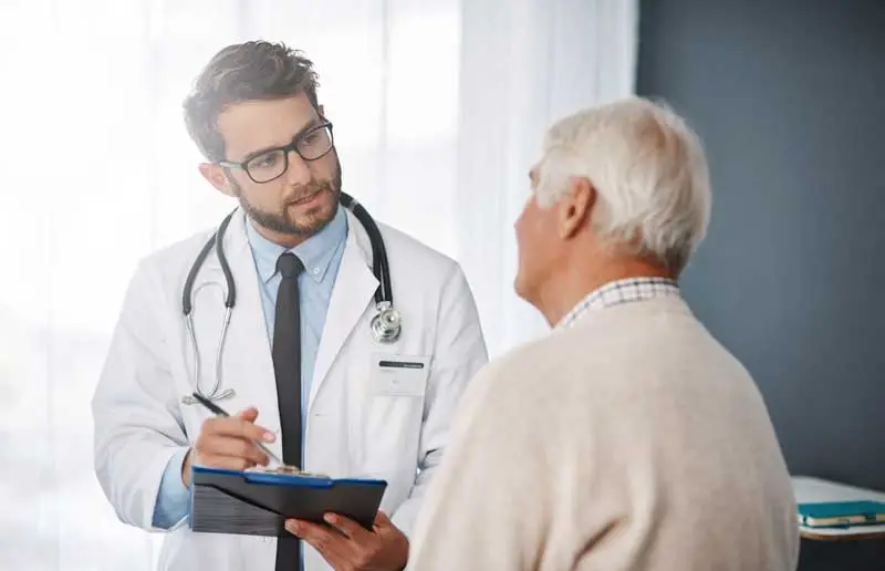 doctor discussing with patient