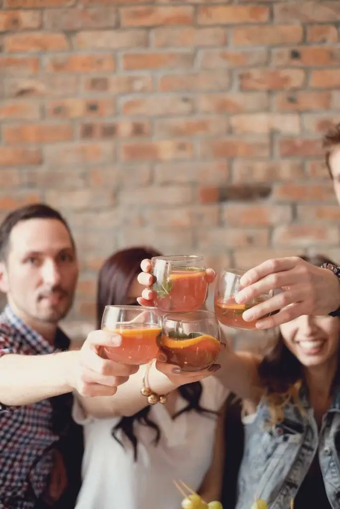 Employee Happy Hour at a brew pub with employees toasting success