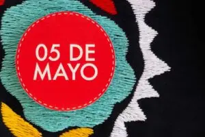 cinco de Mayo pattern and words stitched on cloth